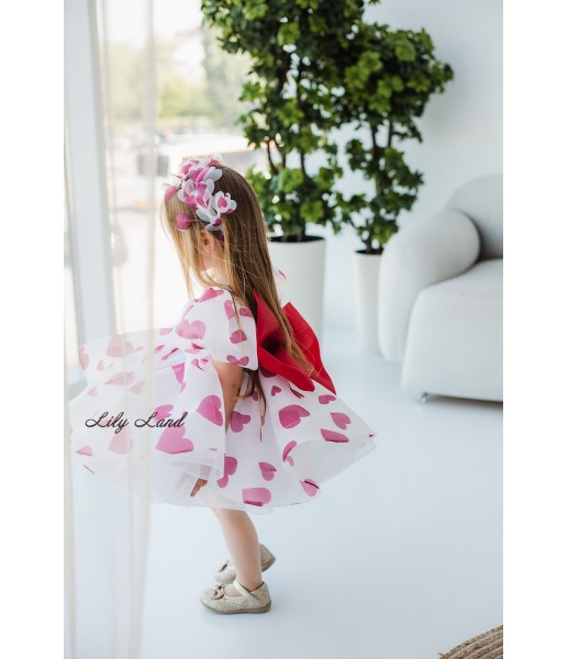 Детское нарядное платье Лори в цветочный принт с розовым бантом