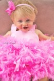 Дитяча святкова сукня Лейла, колір яскраво рожевий з пір'ям